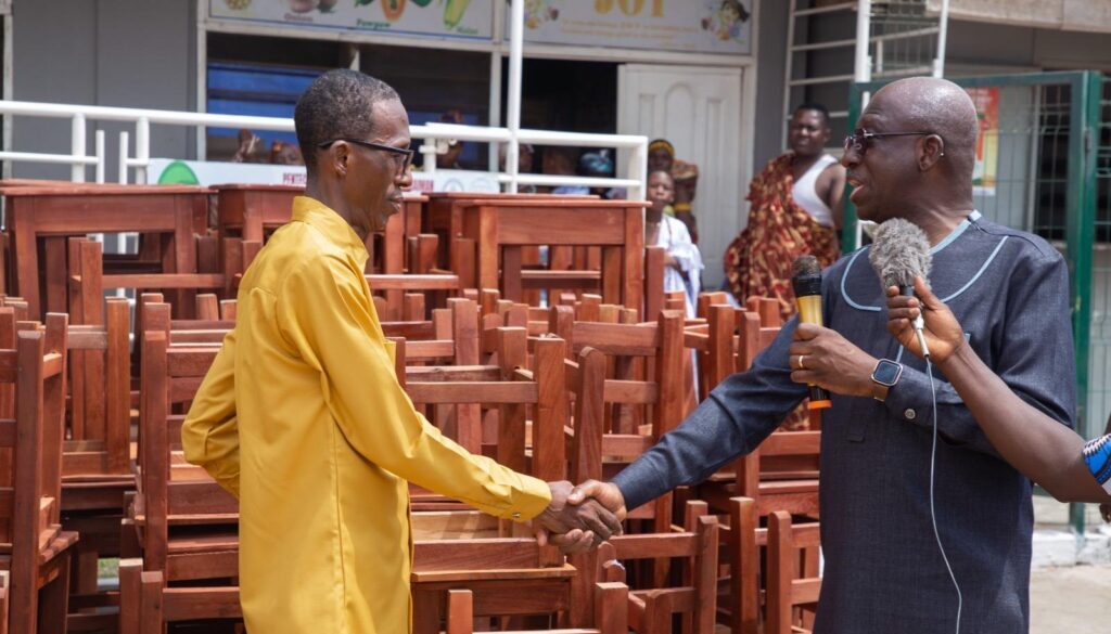 Mr-Abraham-Asante-Obeng-Headmaster-of-Pentecost-Prepartory-School-in-handshake-with-Dr-Emmanuel-Kwame-Obeng-RCDII-President